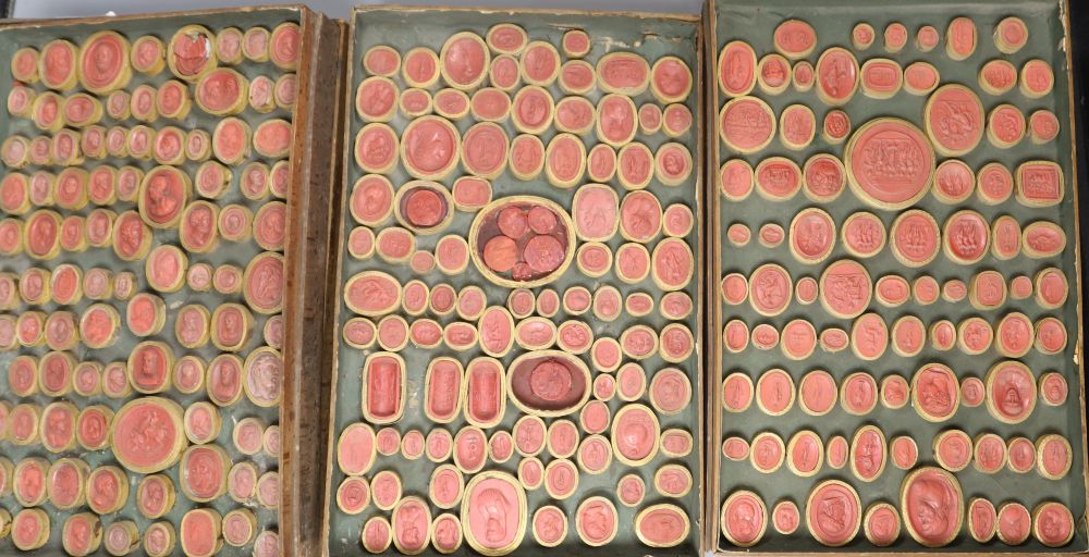 Six trays of 19th century classical intaglios and cameos